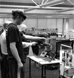 A student using the HoloLens technology. The student is wearing a VR head